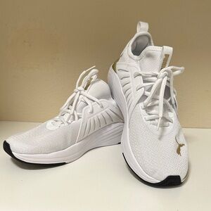 Ladies Puma White and Gold Athletic Shoes size 8.5. Excellent condition